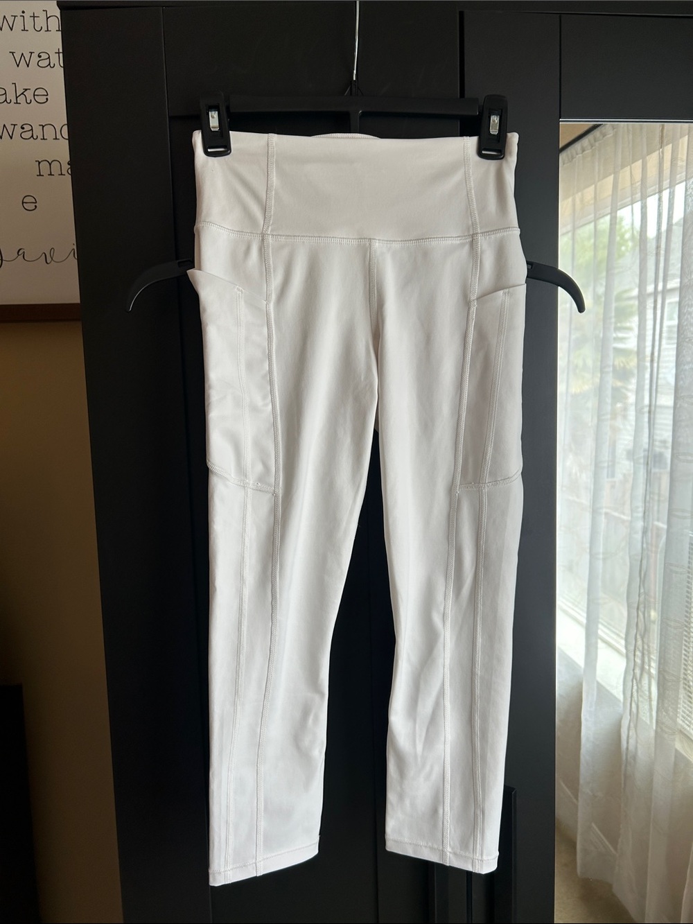 Athleta Ultimate Stash II Capri. White Crop Leggings with Side Pockets